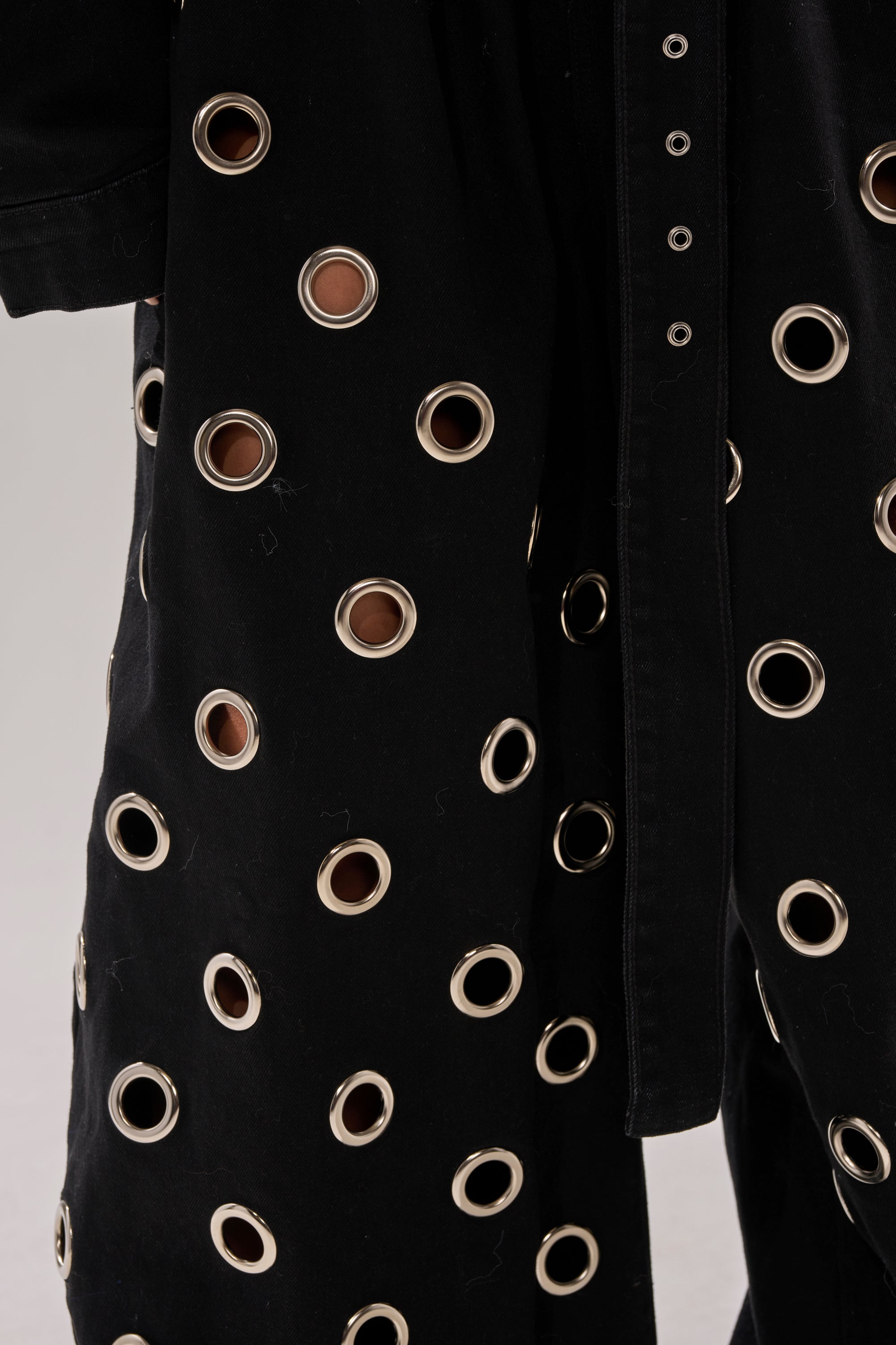 PLAY YOUR CARDS RIGHT DENIM JUMPSUIT WITH GROMMETS